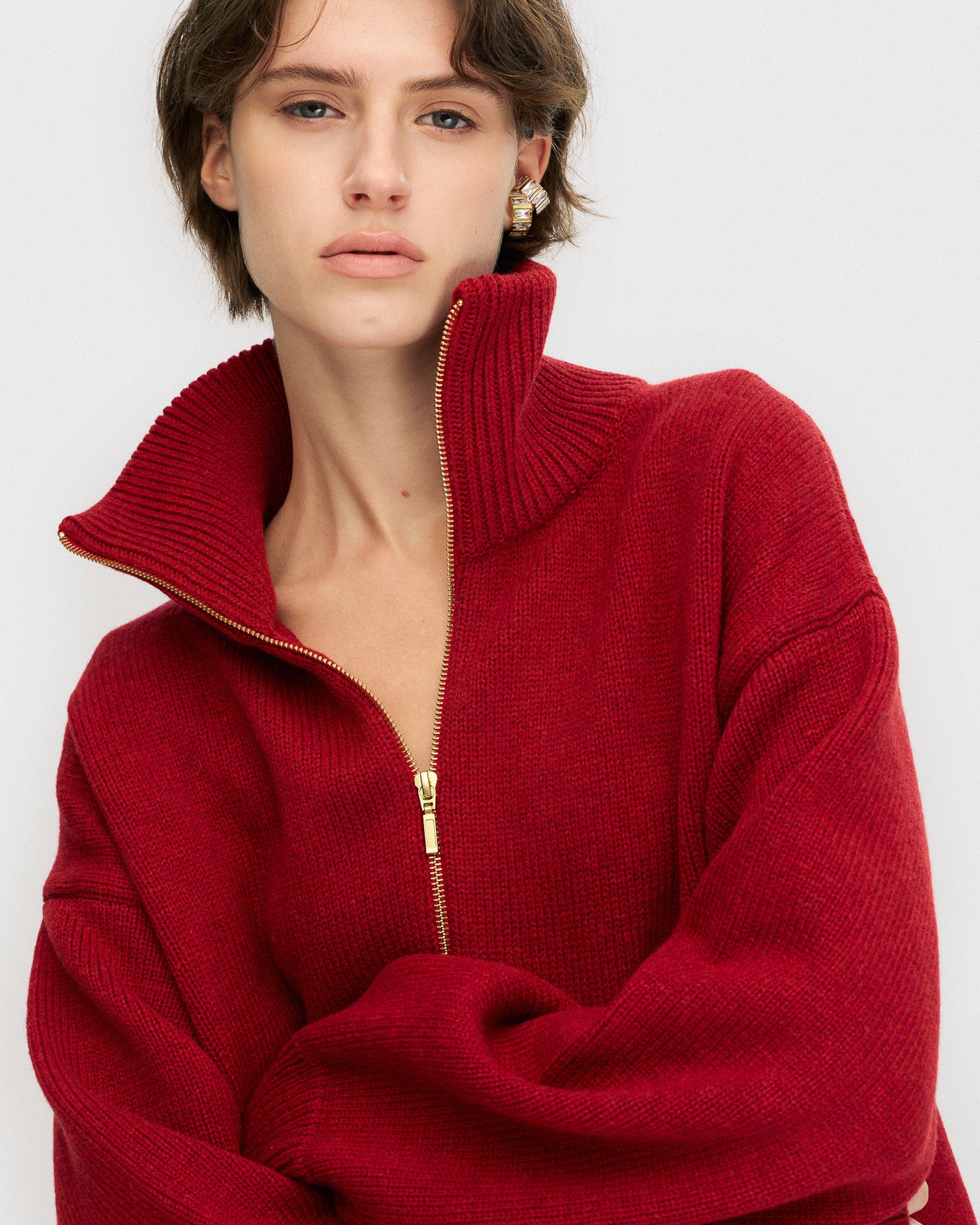 Deep red zip-up sweater