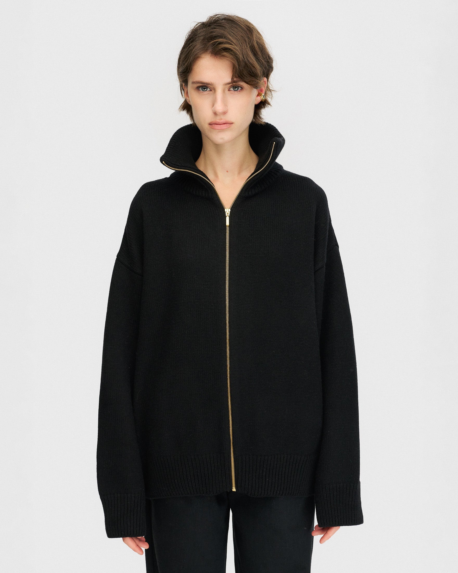 Black zip-up sweater