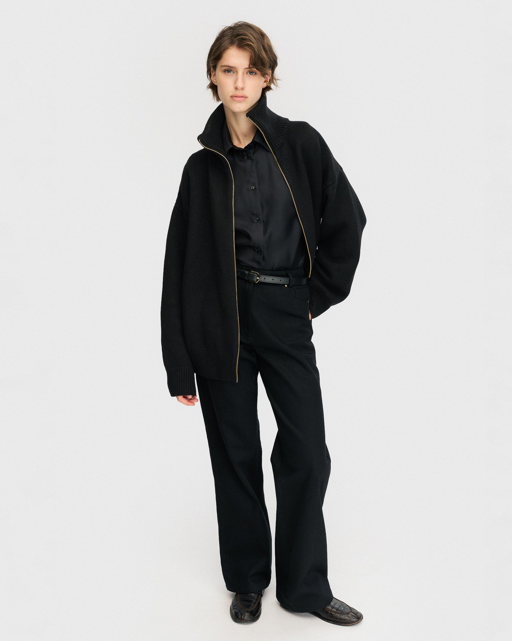Black zip-up sweater