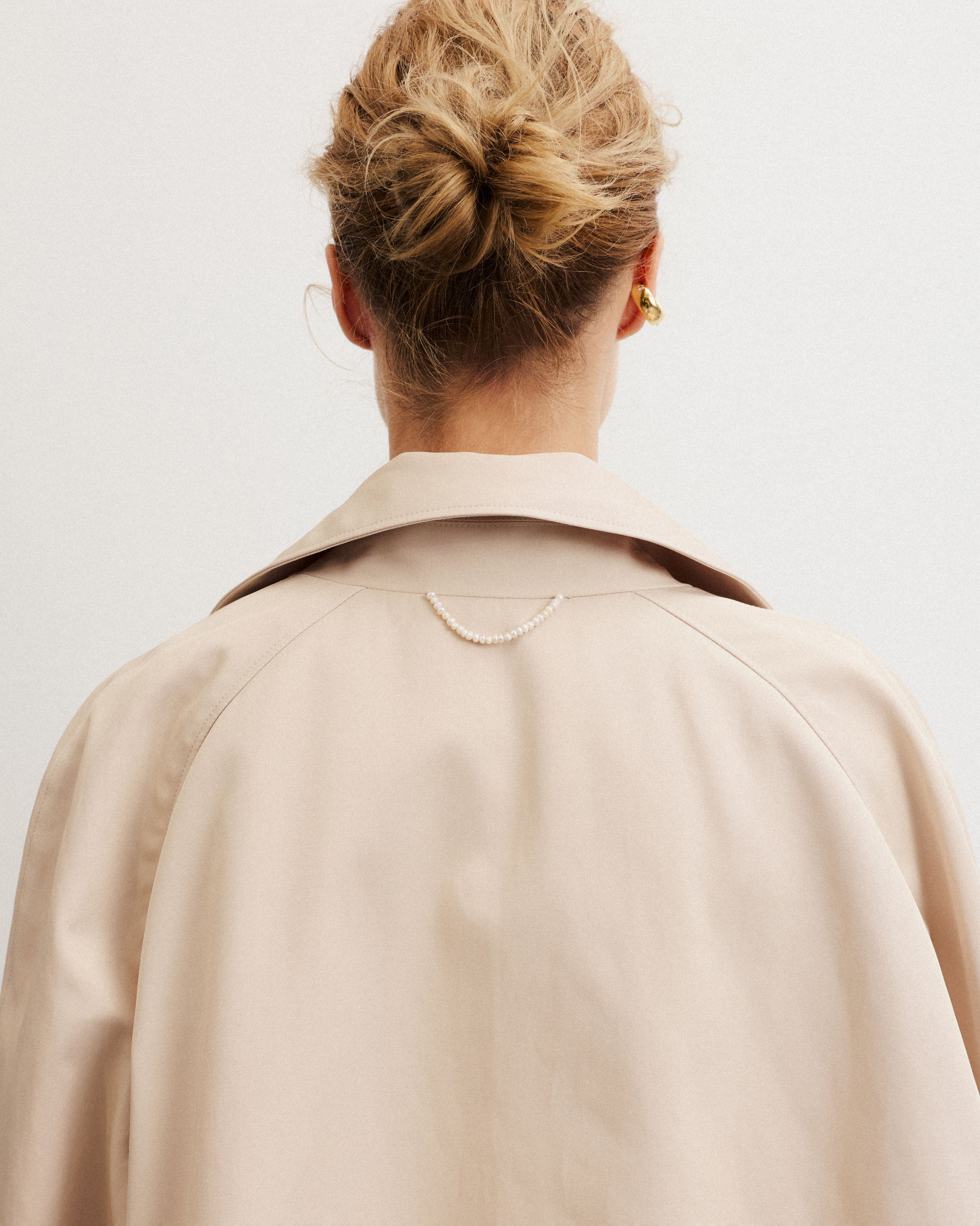 Beige summer trench coat