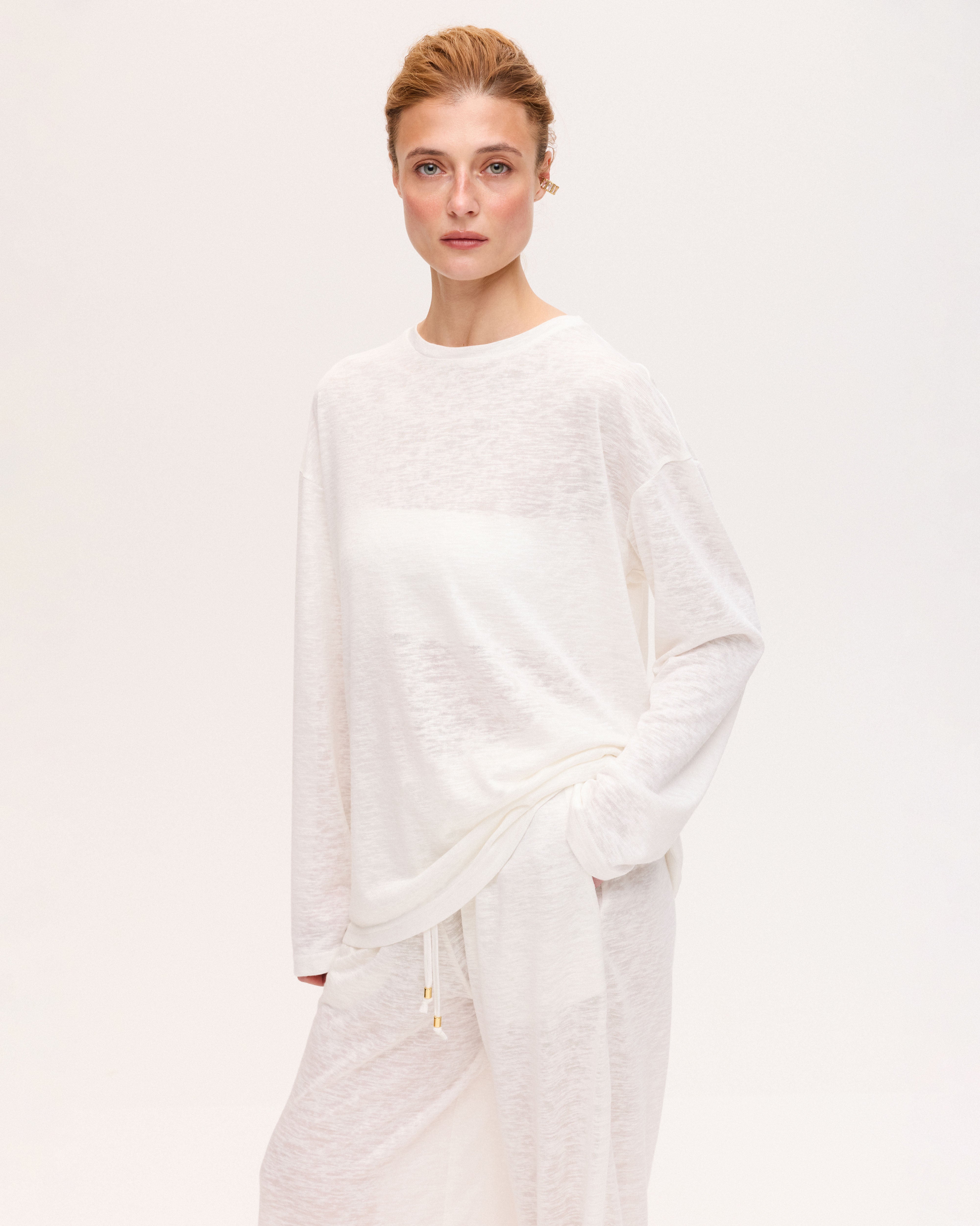 Sheer white wide-leg pants