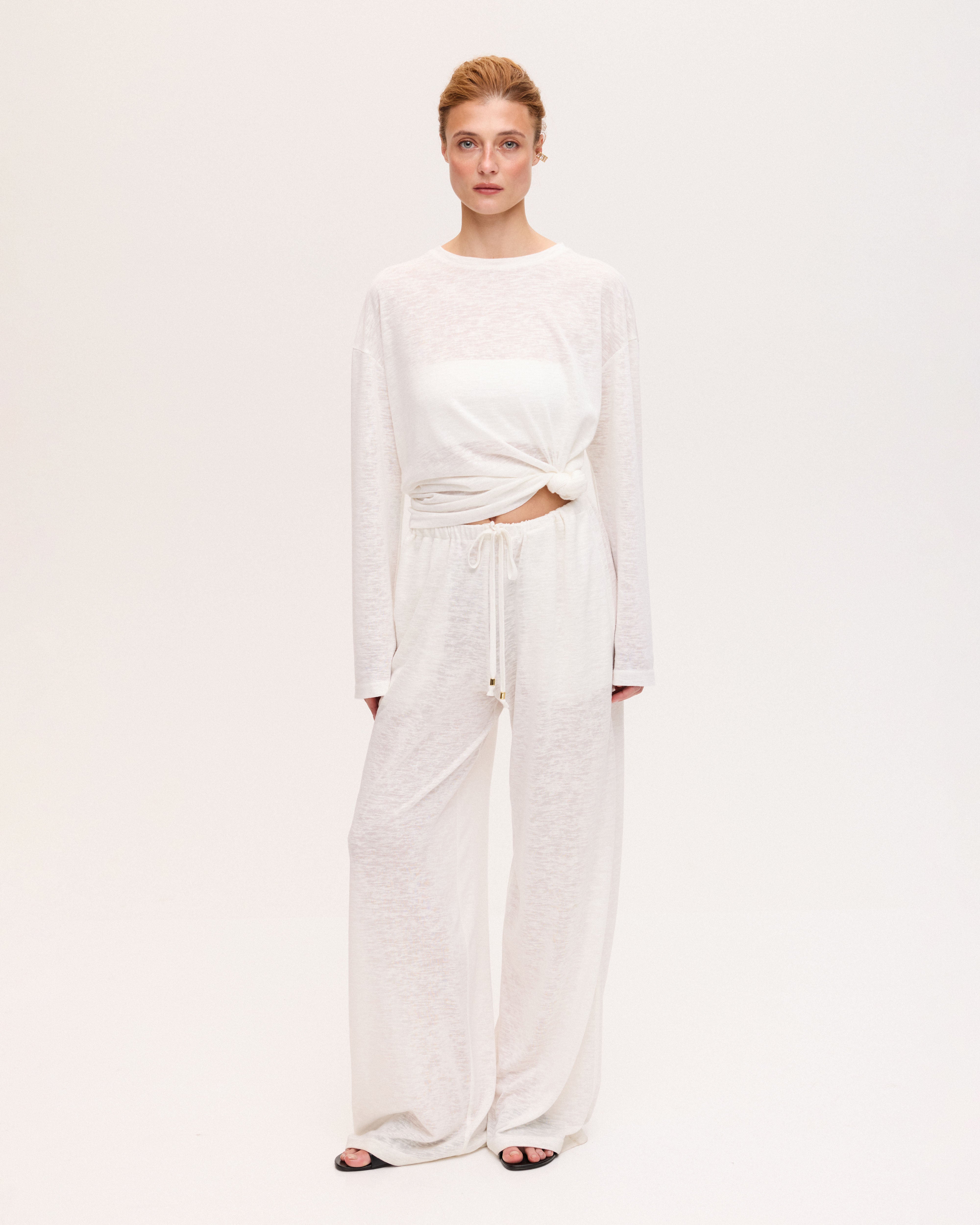 Sheer white wide-leg pants
